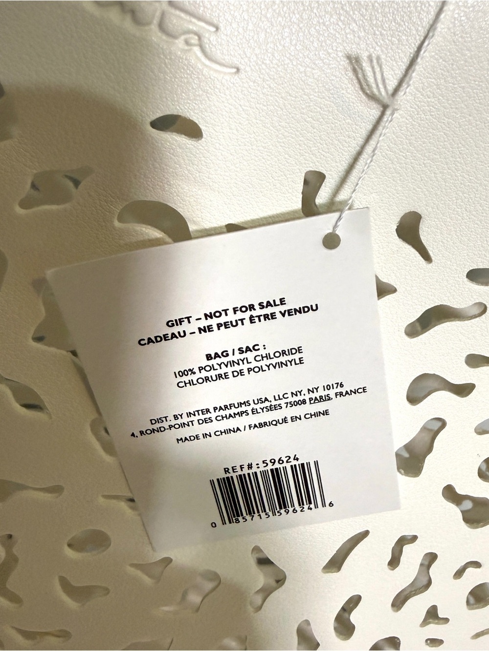 Oscar de la Renta Fragrance White Preforated Laser-Cut Tote Bag - Picture 3 of 16